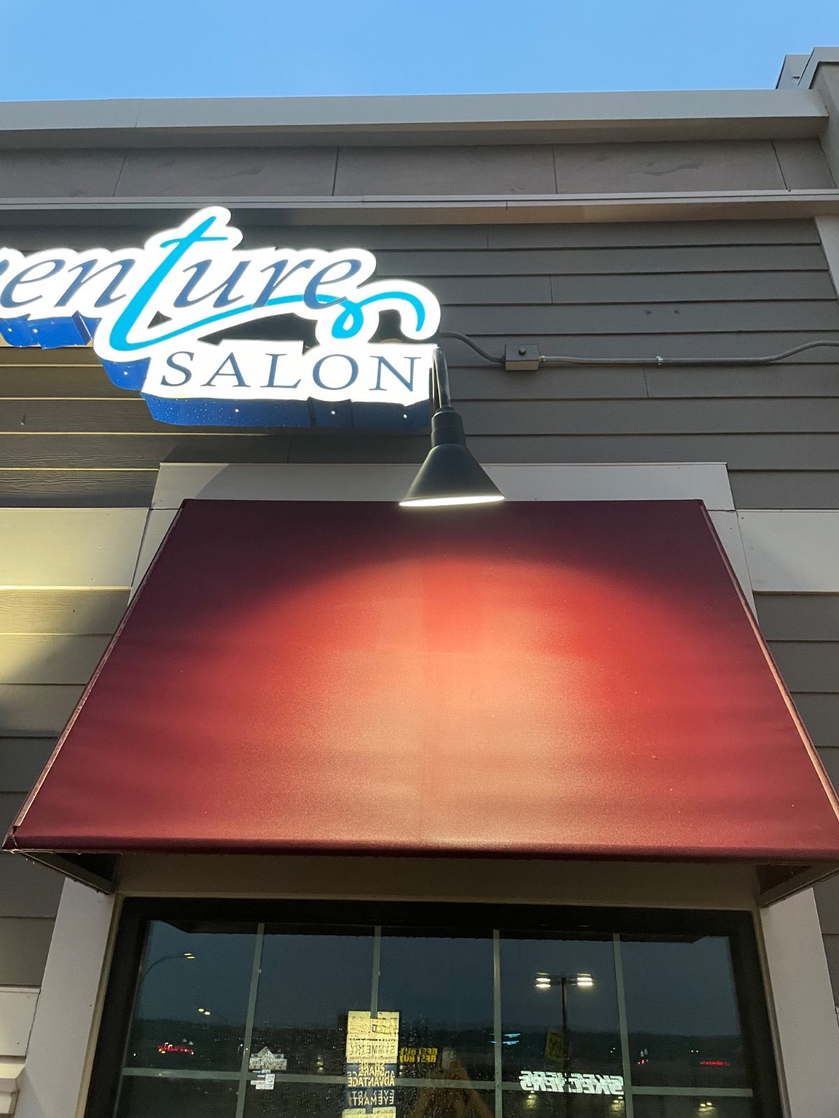 Same salon storefront awning after specialty awning cleaning, Hermantown MN